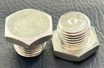 Dop de ulei hexagonal exterior din oțel carbon galvanizat alb